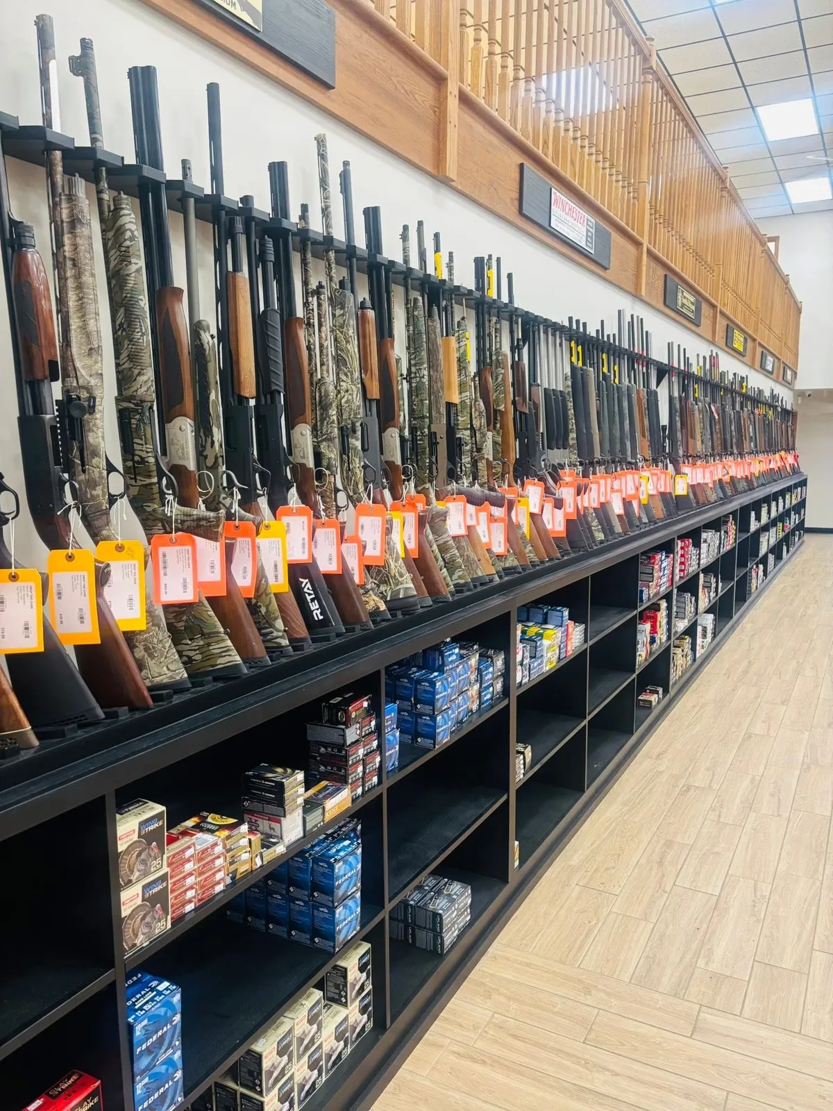 The shotgun rack and shotshell shelves at Drop Tine Guns