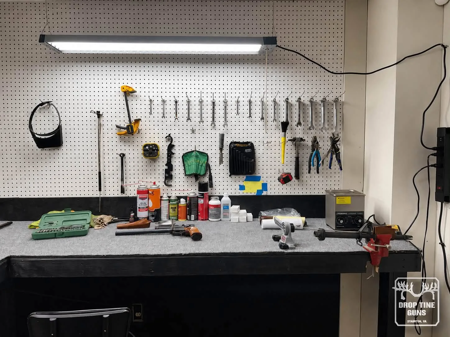 Jason Jordan's gunsmithing tools on the wall above his bench at Drop Tine Guns